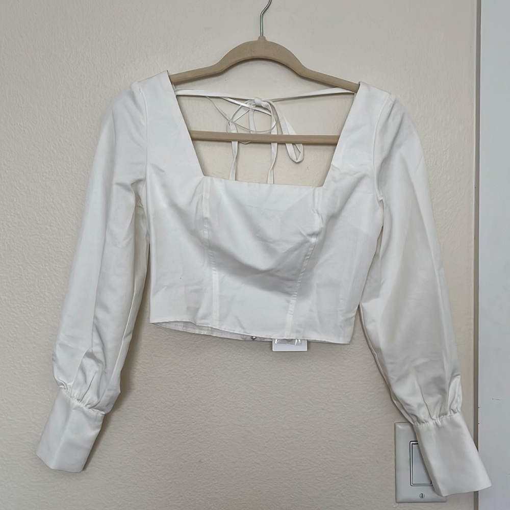 White corset style top. Size XS. NWT